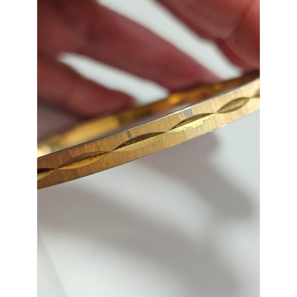 Monet gold tone diamond cut bangle bracelet 7.75"